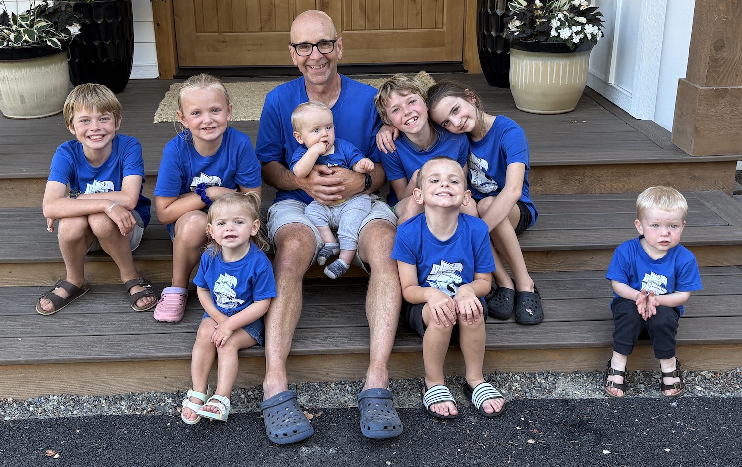 Brad with his 8 grandkids